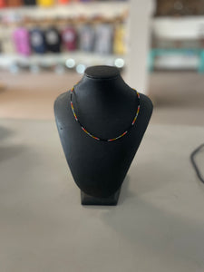 Beaded Necklace with black yellow red & silver