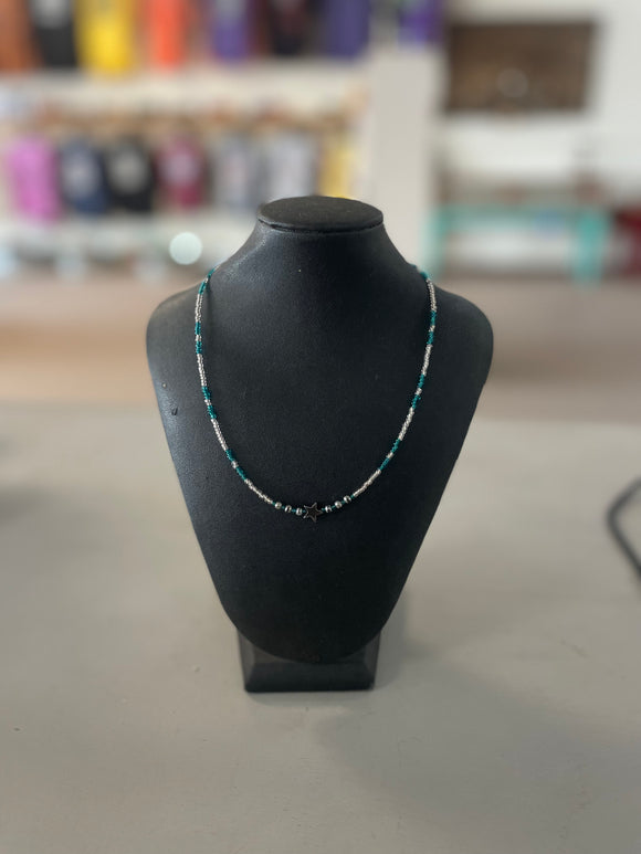 Beaded teal & clear necklace with star charm