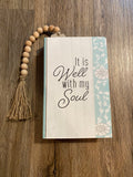 Wood, beaded tabletop book