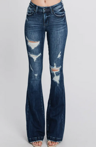 Distressed Mid Rise Stretch Flare Jeans With Trouser Hem